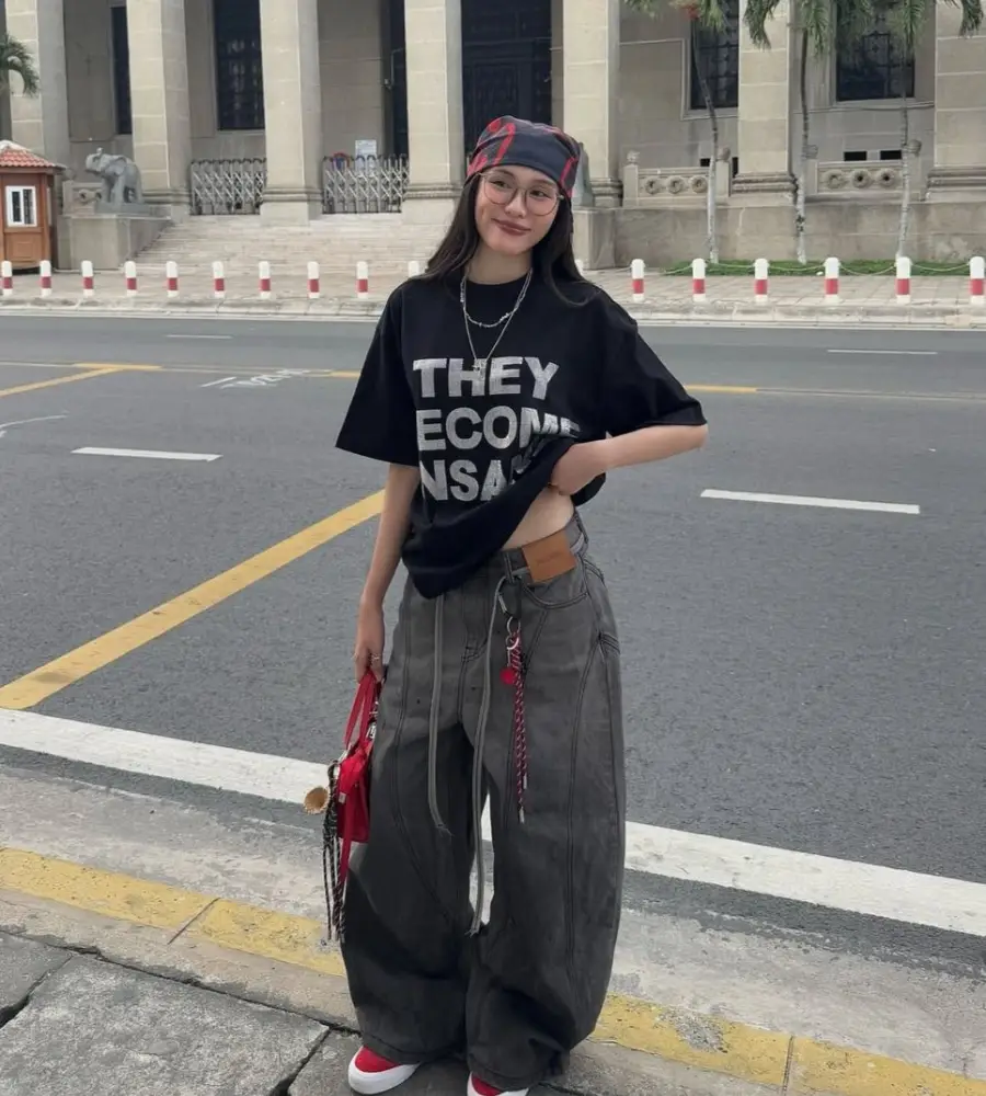 Black Graphic Oversized Tee with Grey Baggy Jeans, Red Sneakers and Bandana Cap