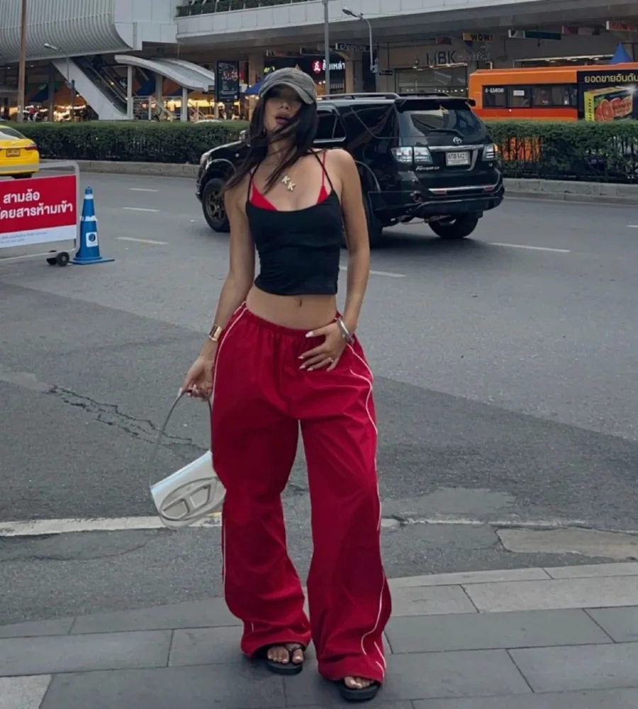 Black Halter Crop Top with Red Track Pants, Cap and Black Slides