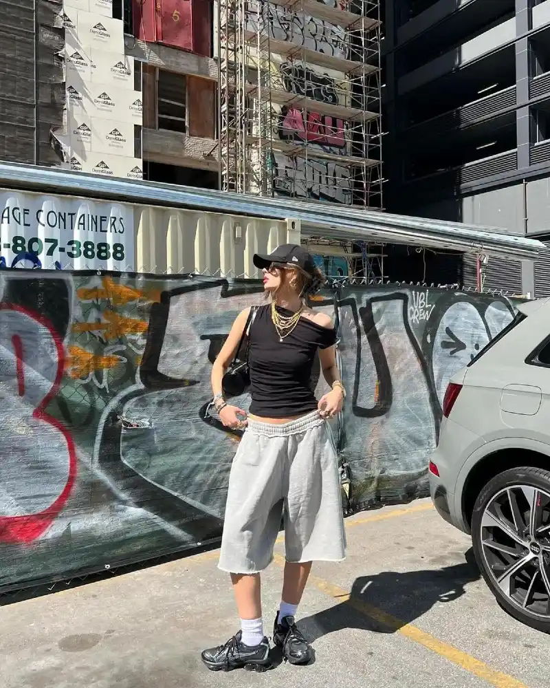  Black Off-Shoulder Fitted Tank and Grey Wide-Leg Sweat Shorts with Chunky Sneakers