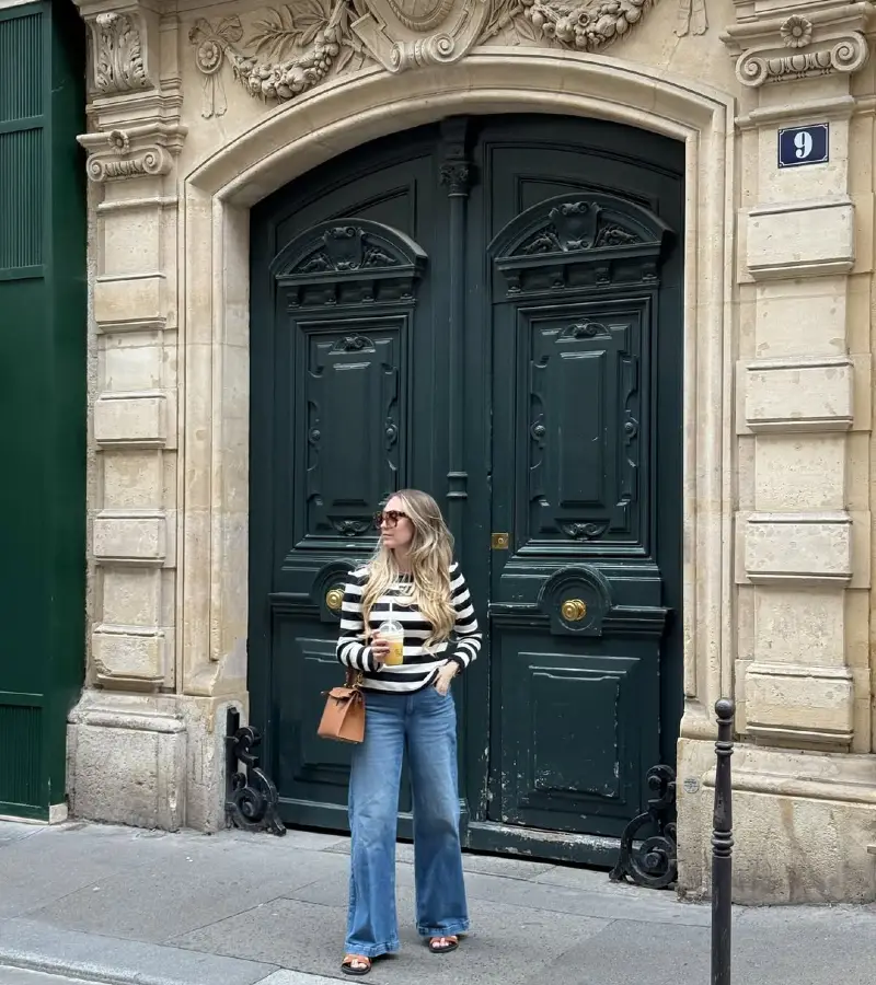 Black & White Stripe Top with Wide-Leg Jeans and Tan Sandal Mules