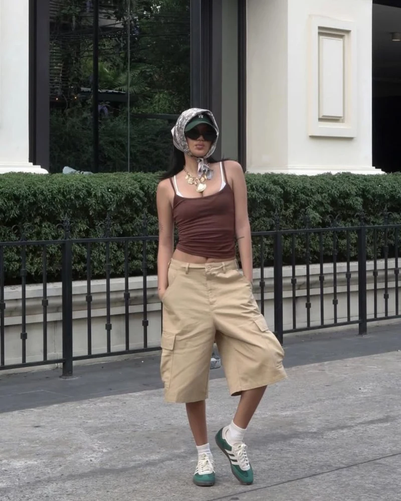 Brown Crop Tank with Beige Cargo Shorts and Green Adidas Sambas
