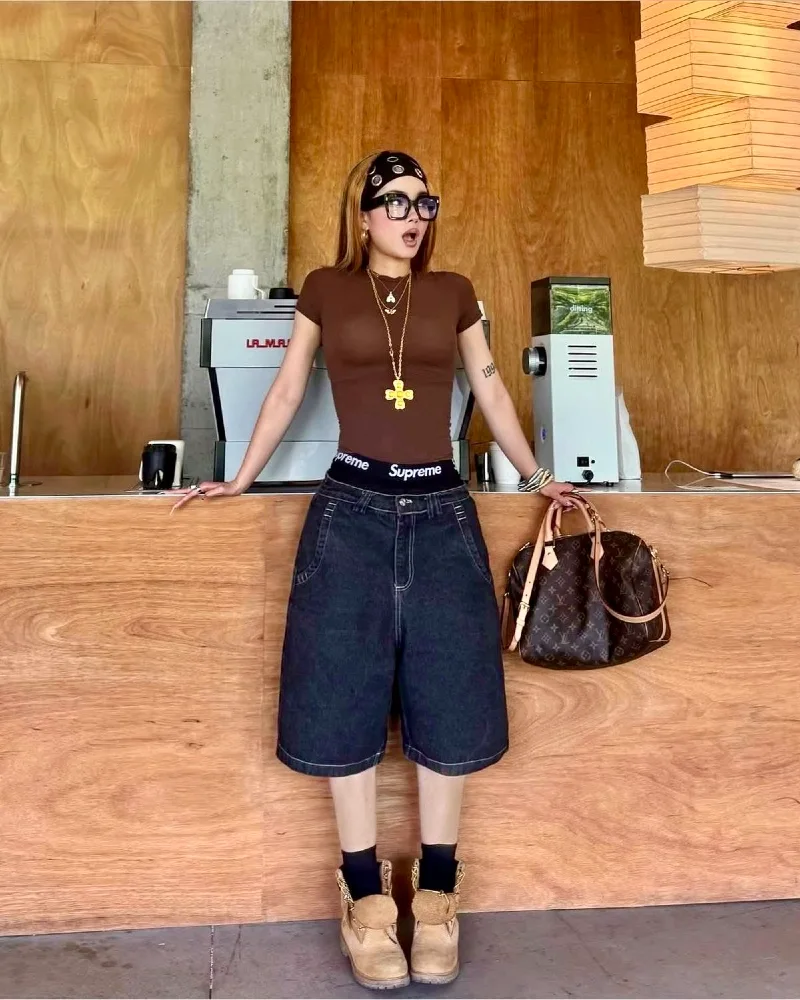 Brown Fitted Tee with Wide Dark Jorts and Timberland Boots