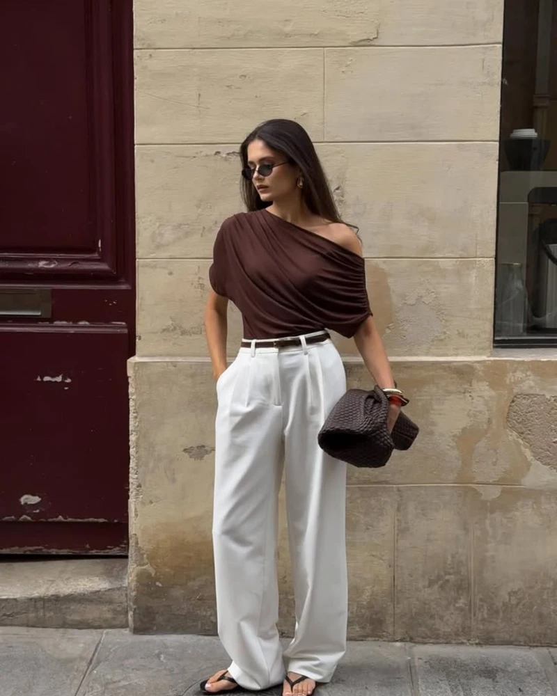  Dark Brown Asymmetric Top + White Wide-Leg Trousers