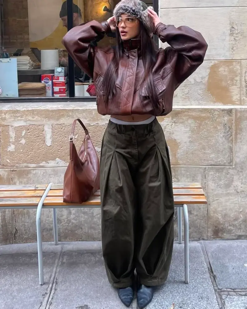 Fur Trapper Hat With a Leather Jacket and Olive Balloon Pants