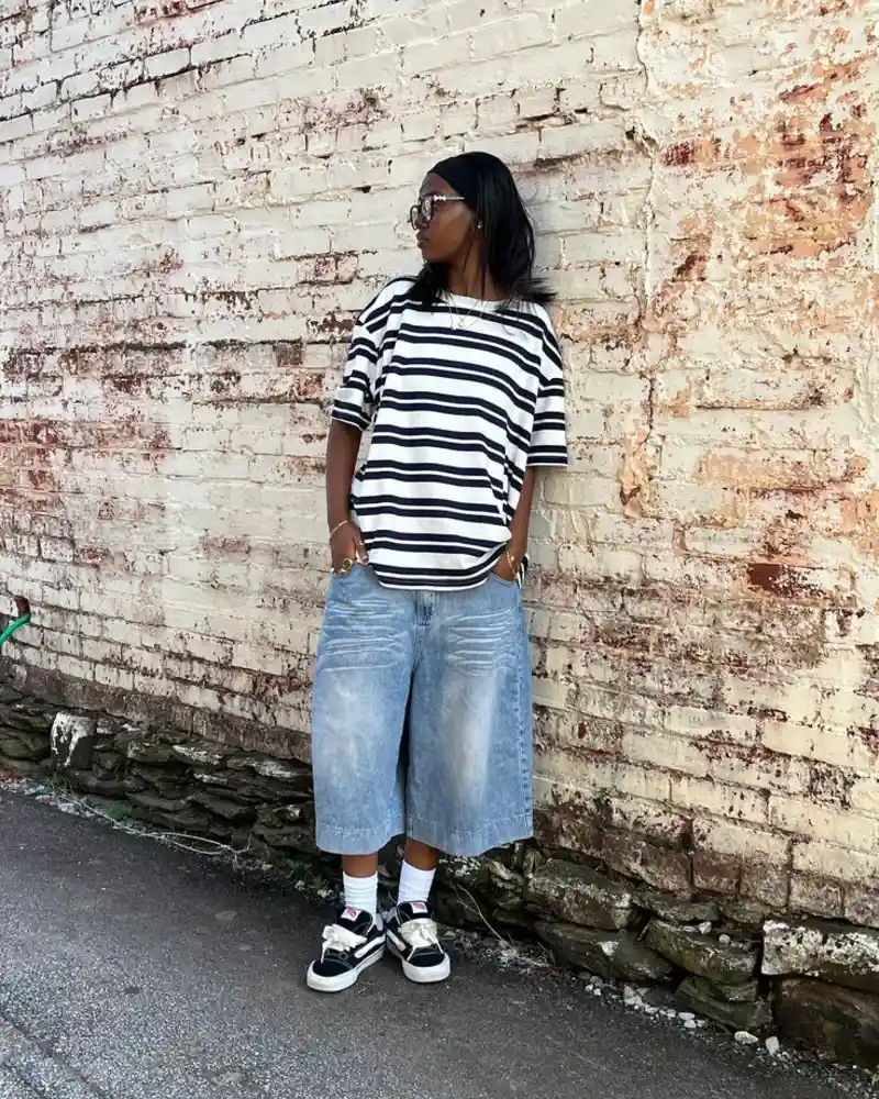 Oversized Black and White Stripe Tee and Light Wash Wide-Leg Denim Shorts with Vans