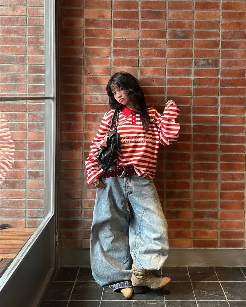 Red Stripes, Faded Denim, and Cowboy Boots Walk Into a Fit