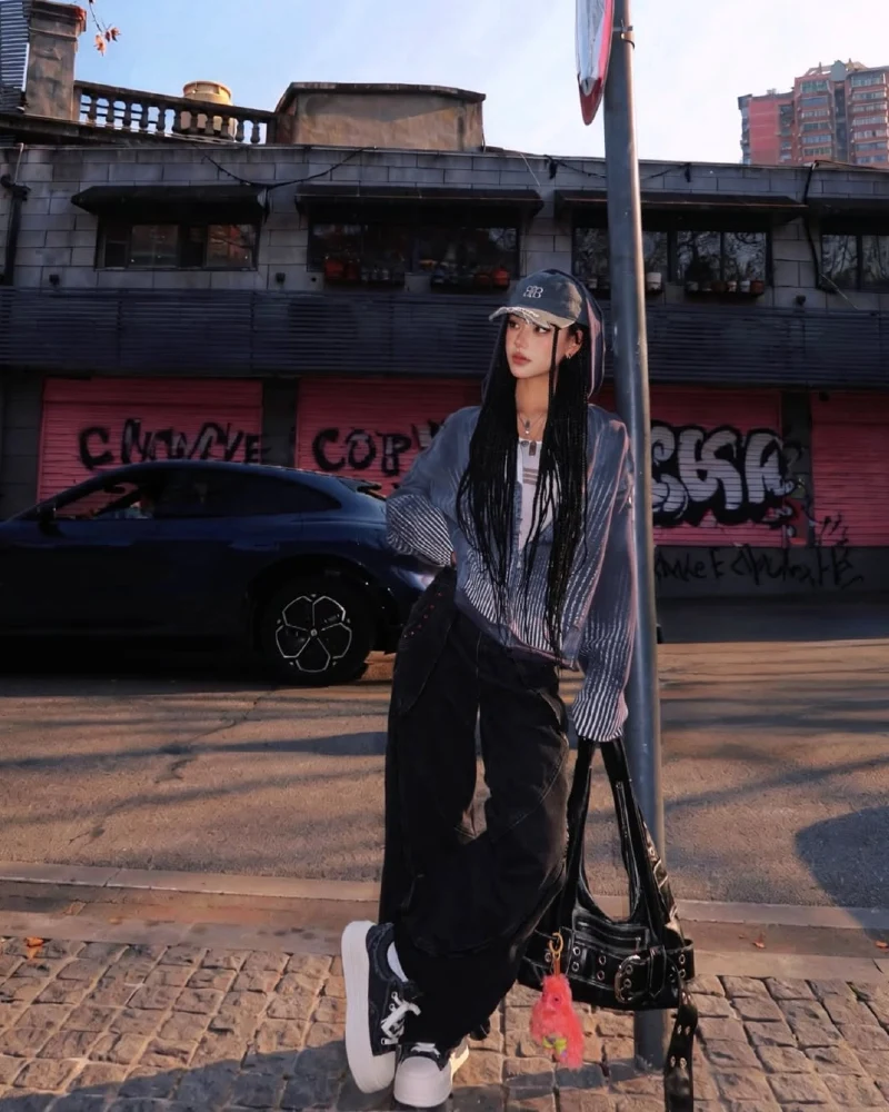 Silver Stripes, Black Denim, and a Graffiti Wall