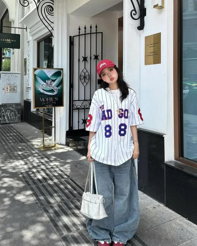 Striped Jersey with Wide-Leg Jeans and Red Cap