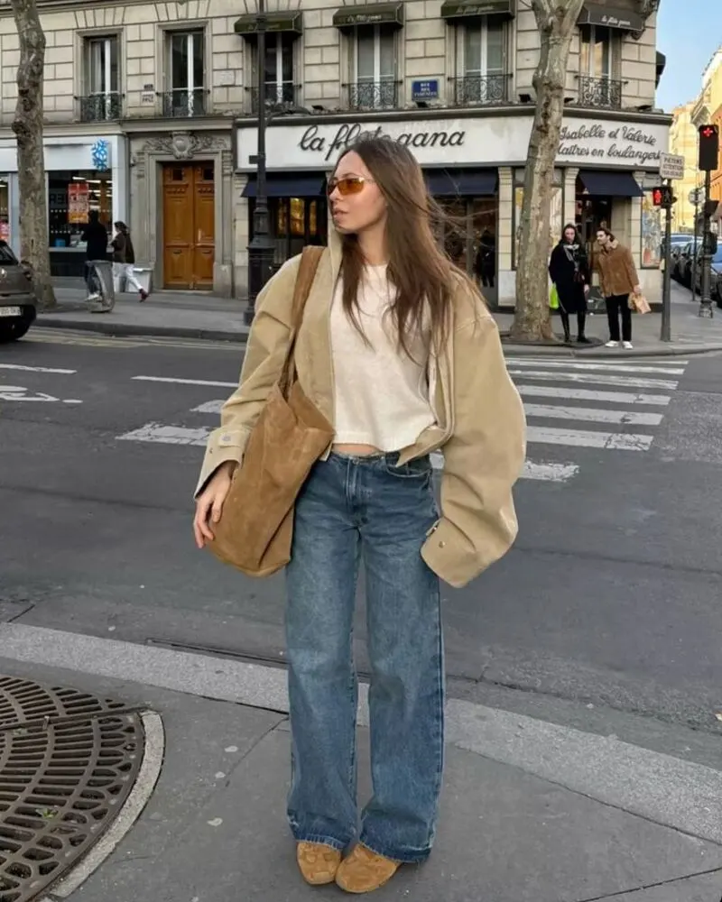 Tan Jacket Over Cream Sweater and Denim