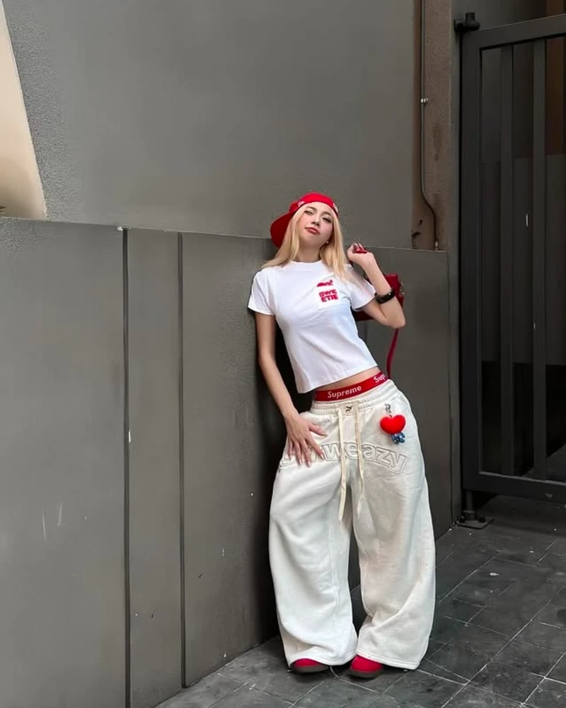 White Baby Tee + Cream Wide Sweat pants + Red Accents