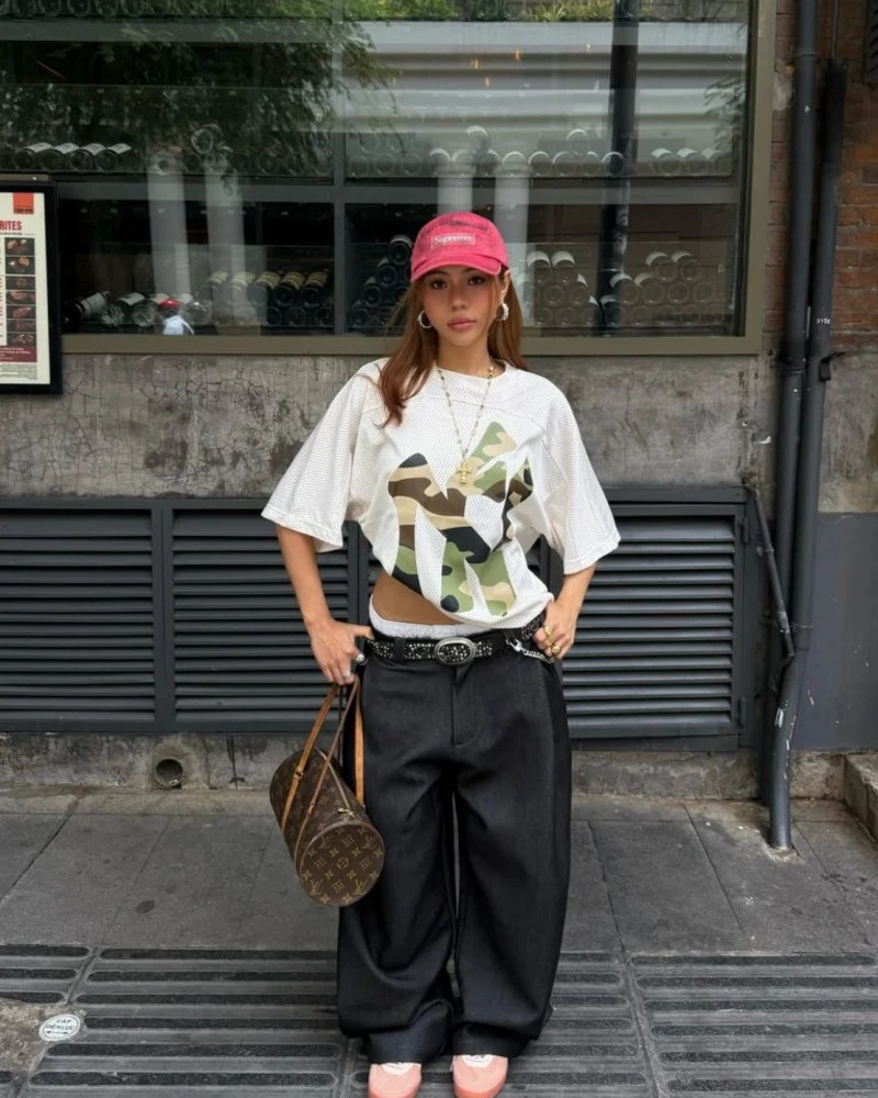 White Camo Mesh Tee with Dark Baggy Trousers and Pink Supreme Cap
