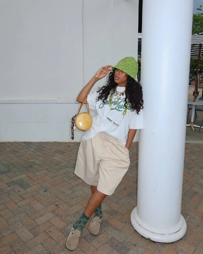 White Graphic Tee + Beige Wide Bermuda Shorts + Suede Clogs