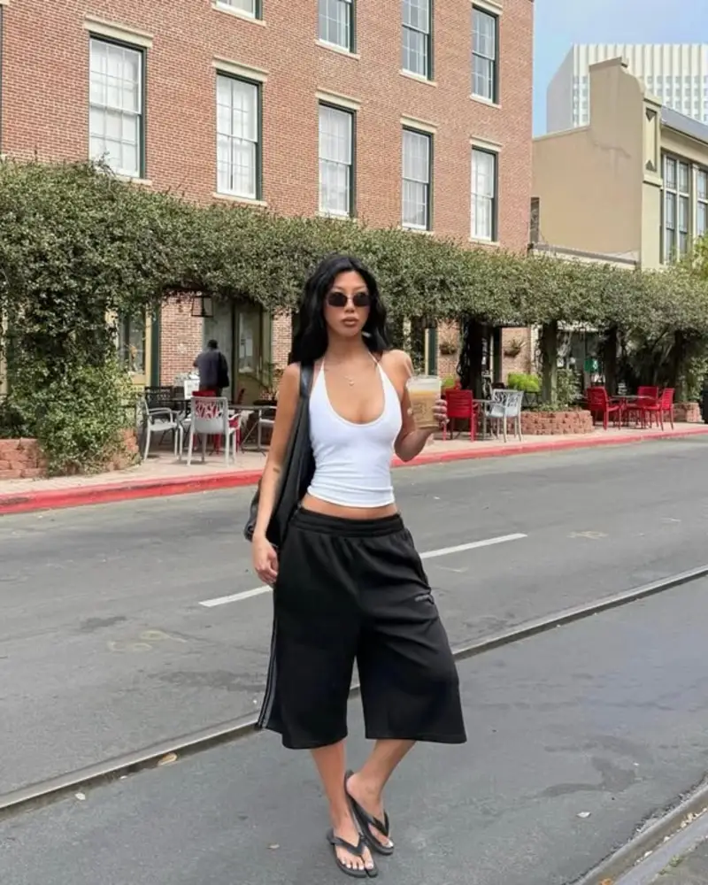  White Halter Tank and Black Wide-Leg Culottes with Flip Flops