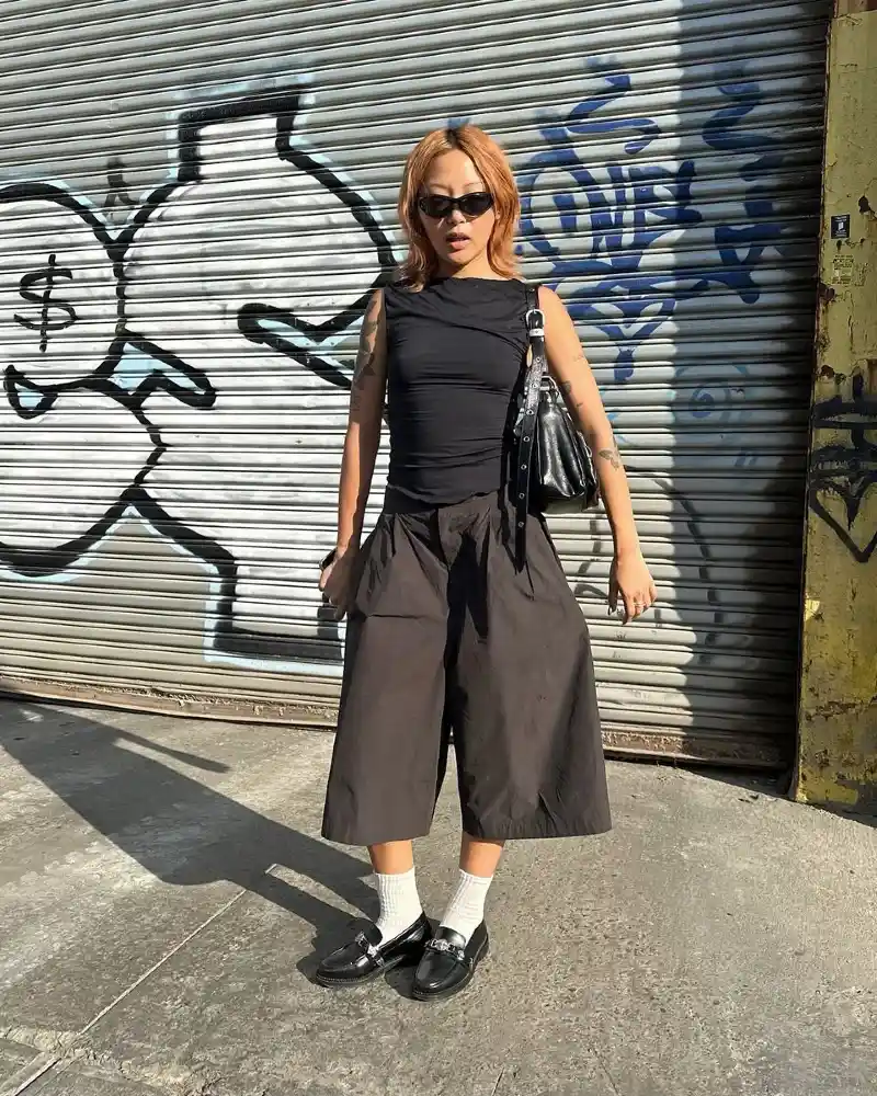 Wide Shorts, White Socks, Sleeveless Black Top