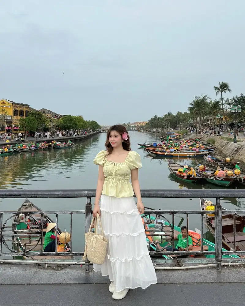 Yellow Puff-Sleeve Crop Top + White Tiered Maxi Skirt + Straw Bag