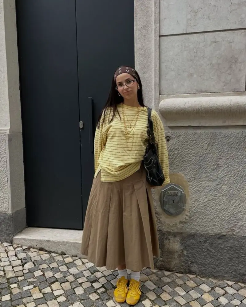 Yellow Striped Long-Sleeve Tee + Khaki Pleated Midi Skirt + Yellow Sneakers