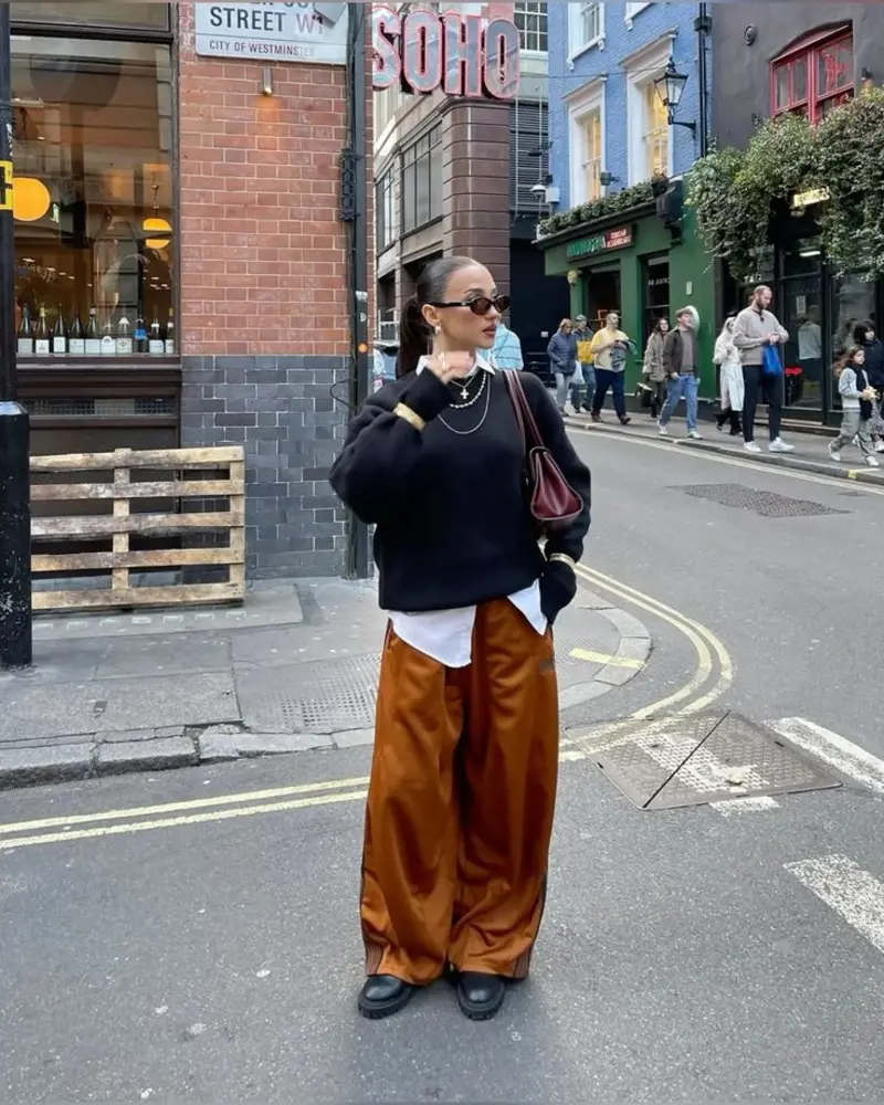 Black Sweater, Rust Satin Pants