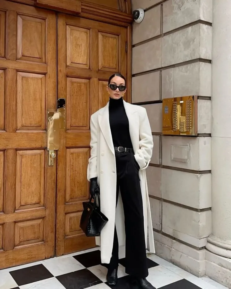  Cream Coat, Black Turtleneck and Trousers