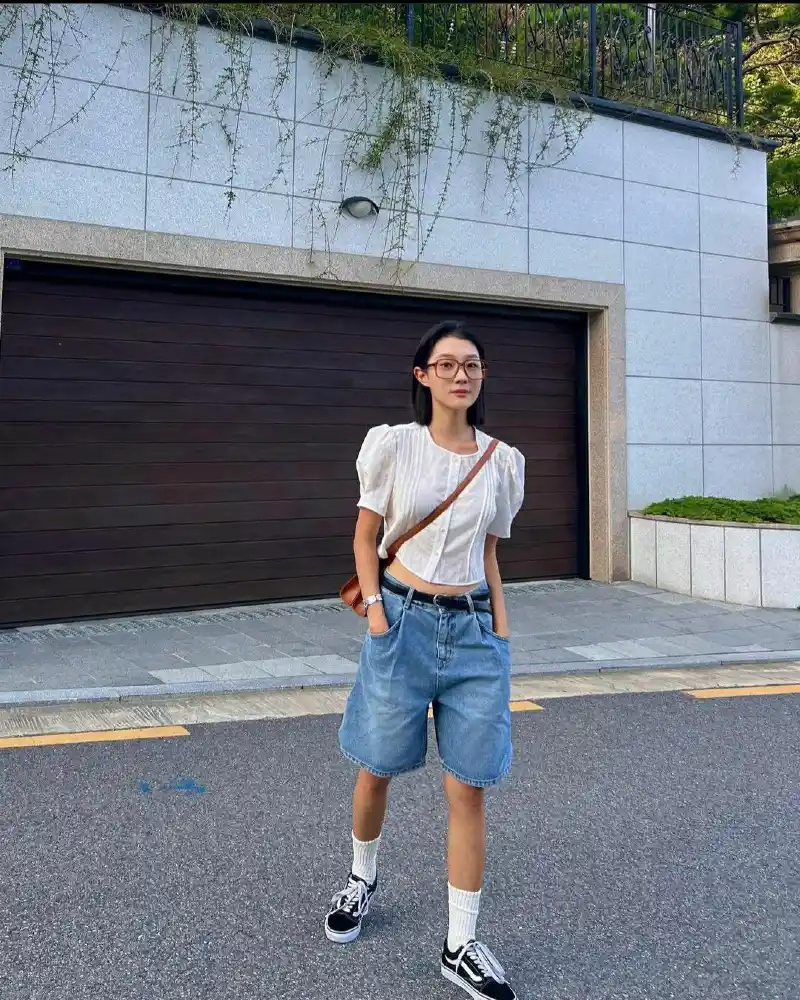 Denim Shorts With Tall Socks And Sneakers