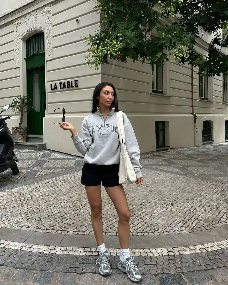 Grey Quarter-Zip and Black Shorts