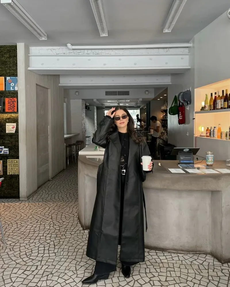 Long Leather Trench Coat Over a Basic Top