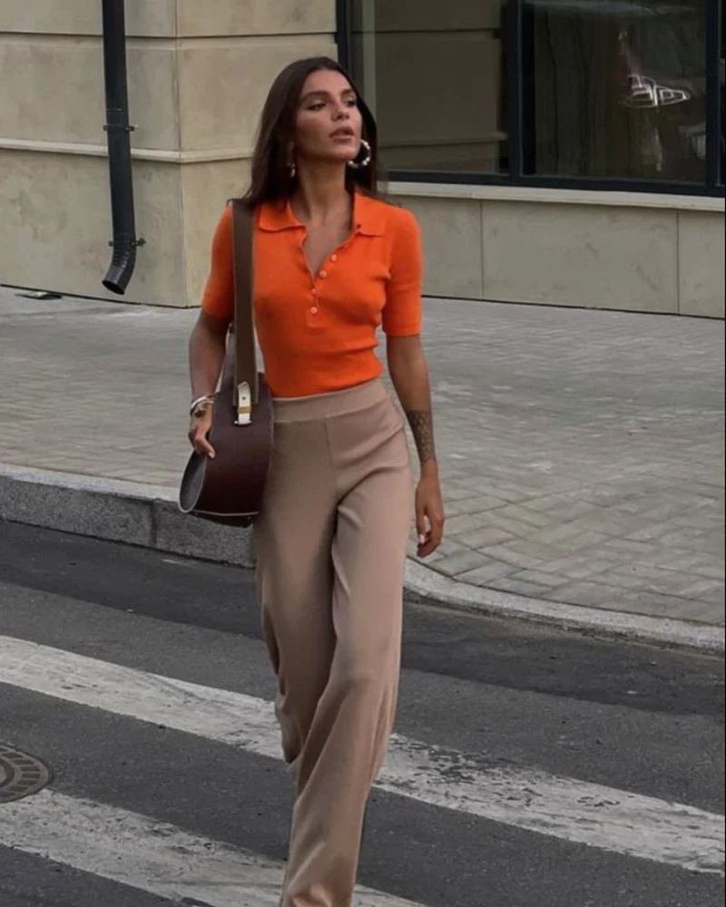 Orange Polo & Tan Trousers