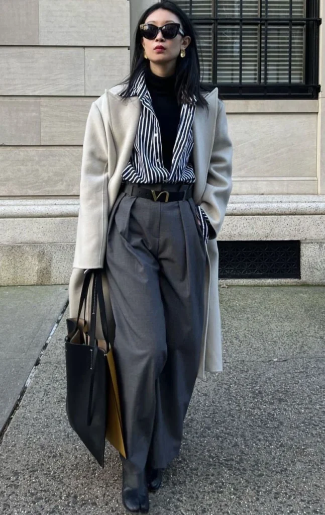 Oversized Coat Over Striped Shirt and Wide-Leg Trousers