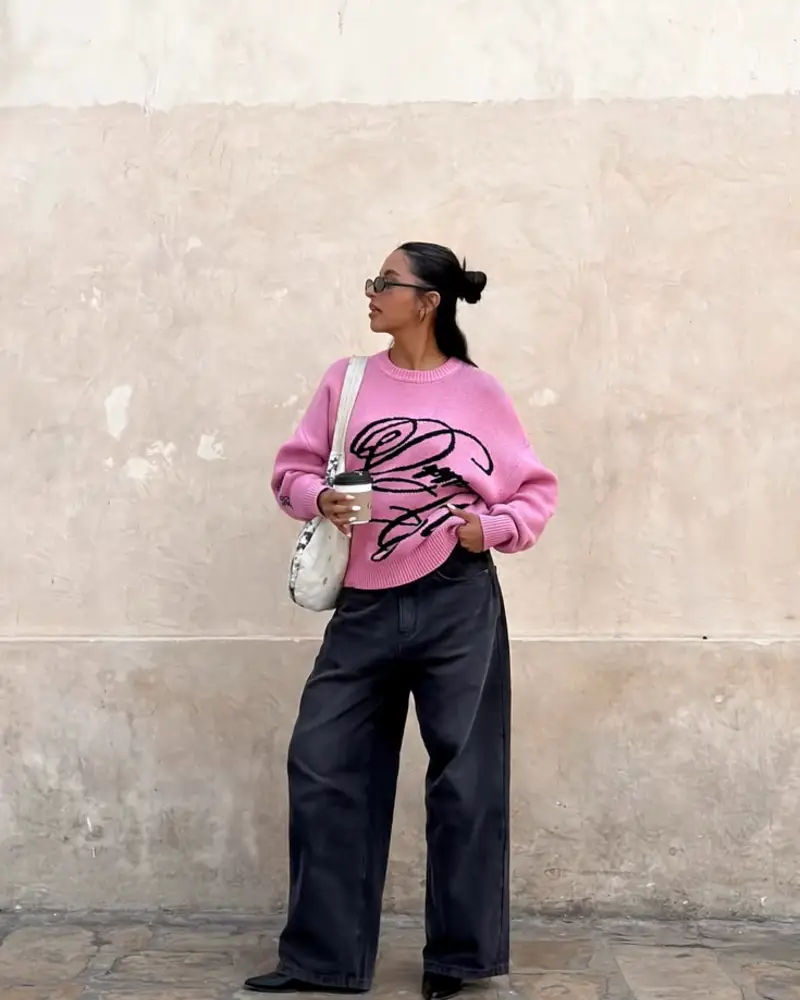 Pink Graphic Sweater & Black Wide-Leg Jeans