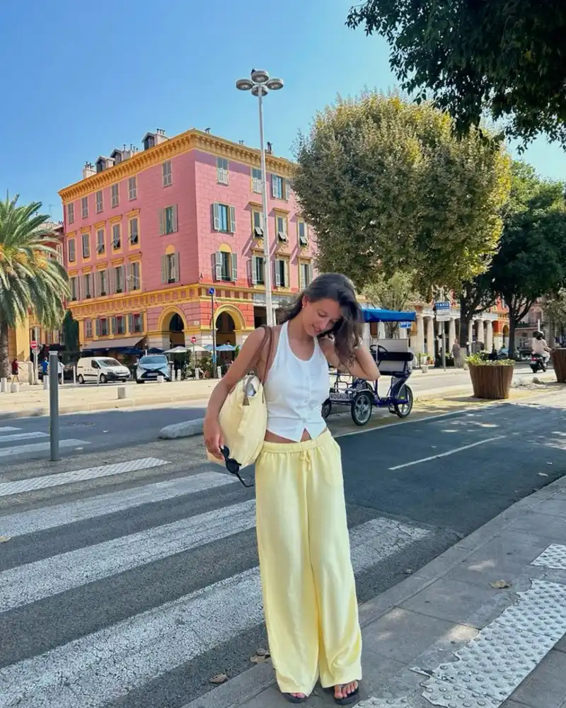 White Button Tank & Pale Yellow Wide-Leg Pants