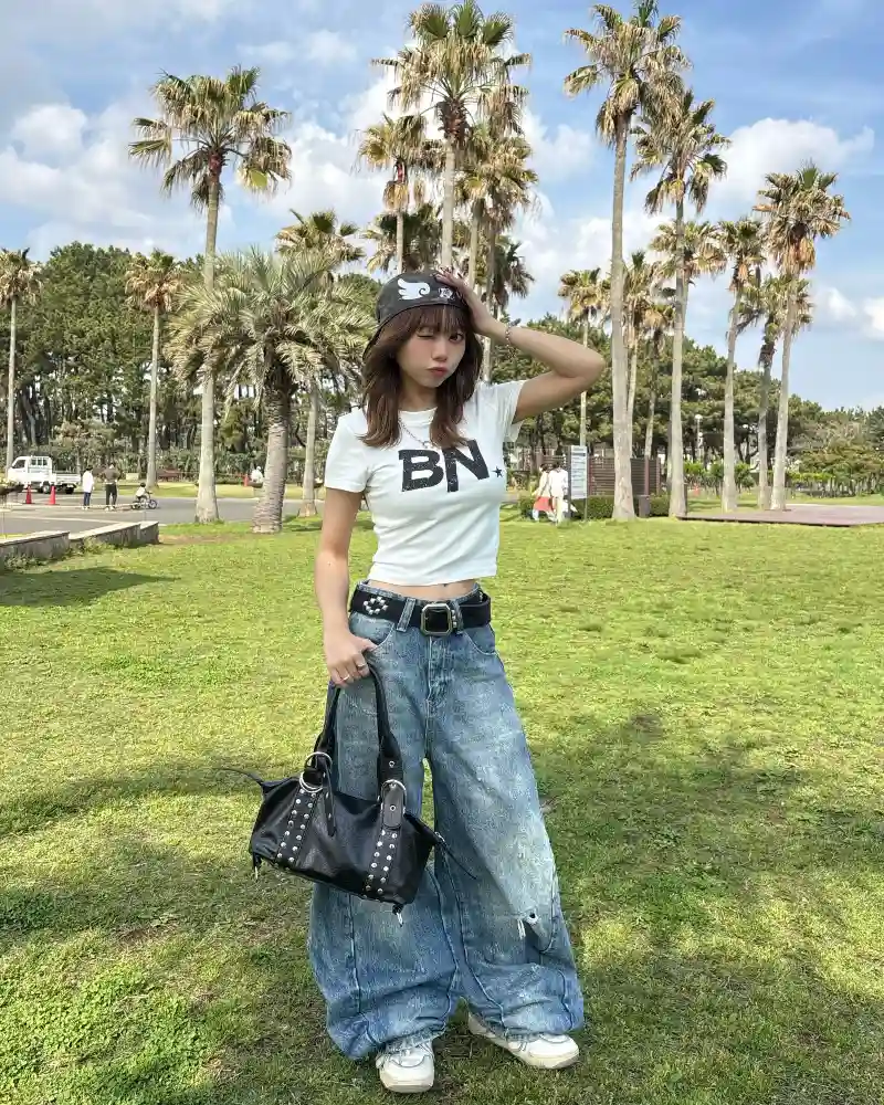  White Graphic Crop Tee, Studded Belt, Wide Denim