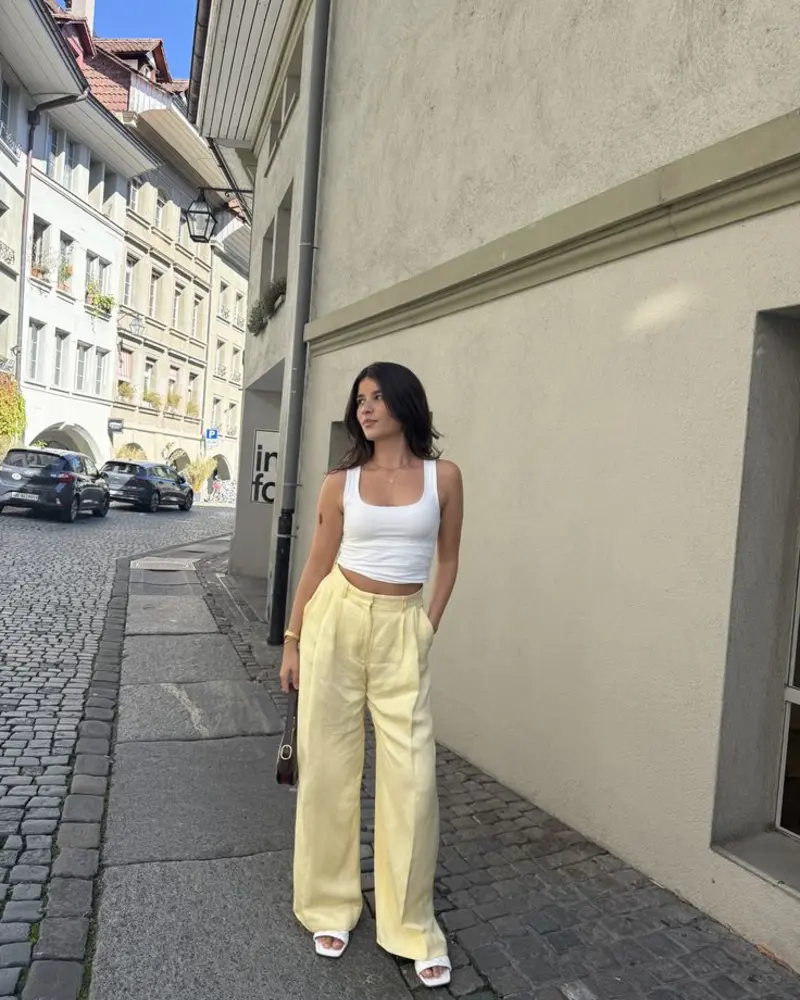  White Tank, Pale Yellow Trousers
