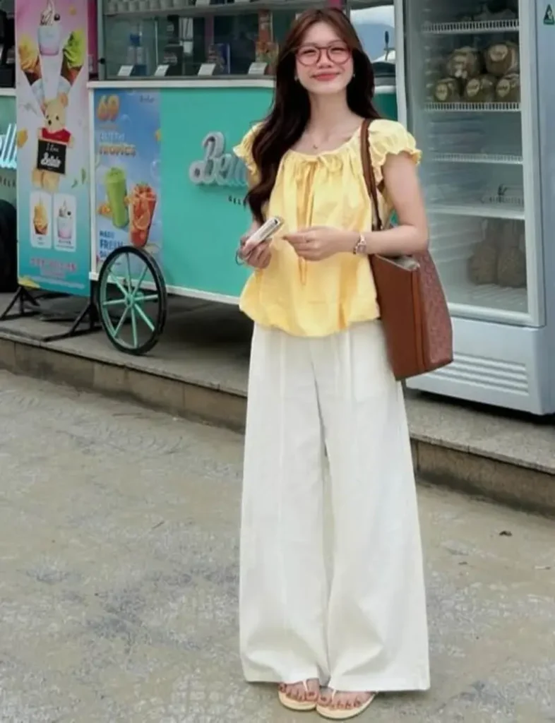 Yellow Ruffle Top & Cream Wide-Leg Pants
