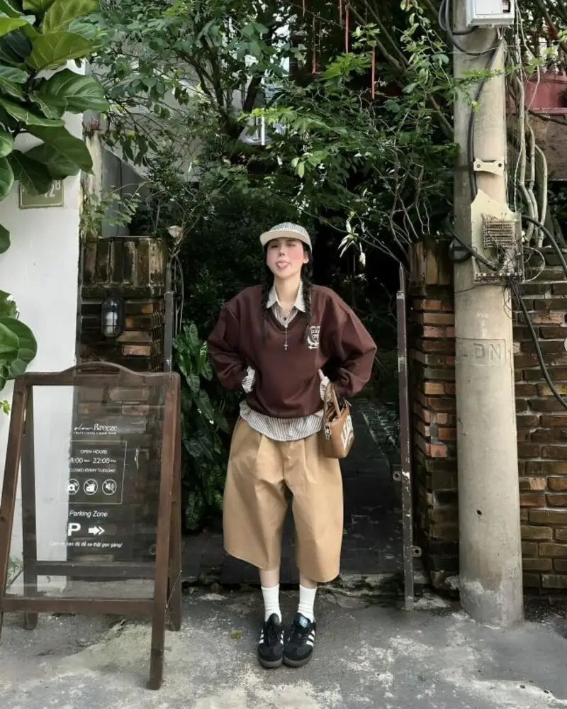 Brown Collegiate Sweatshirt + Layered Collared Shirt + Wide Shorts