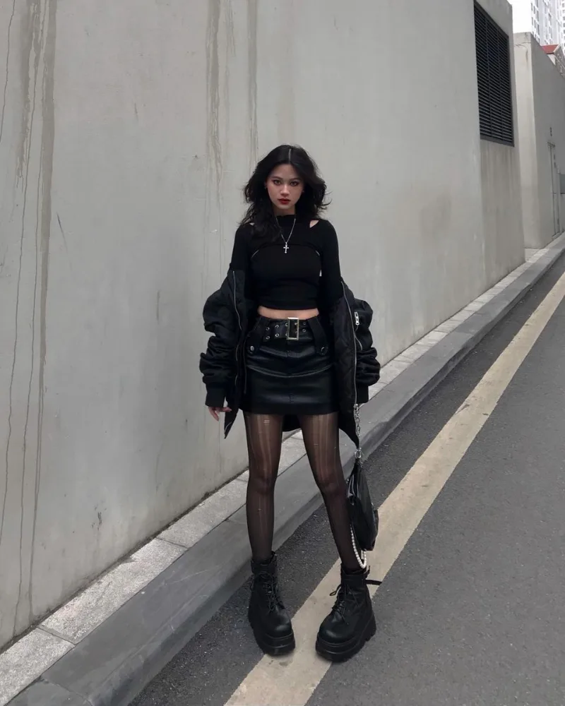 Cable Knit Sweater with Belted Leather Mini Skirt