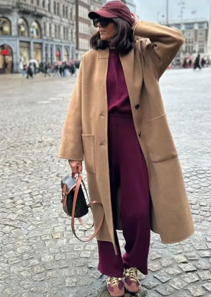 Camel Coat With a Burgundy Sweatshirt