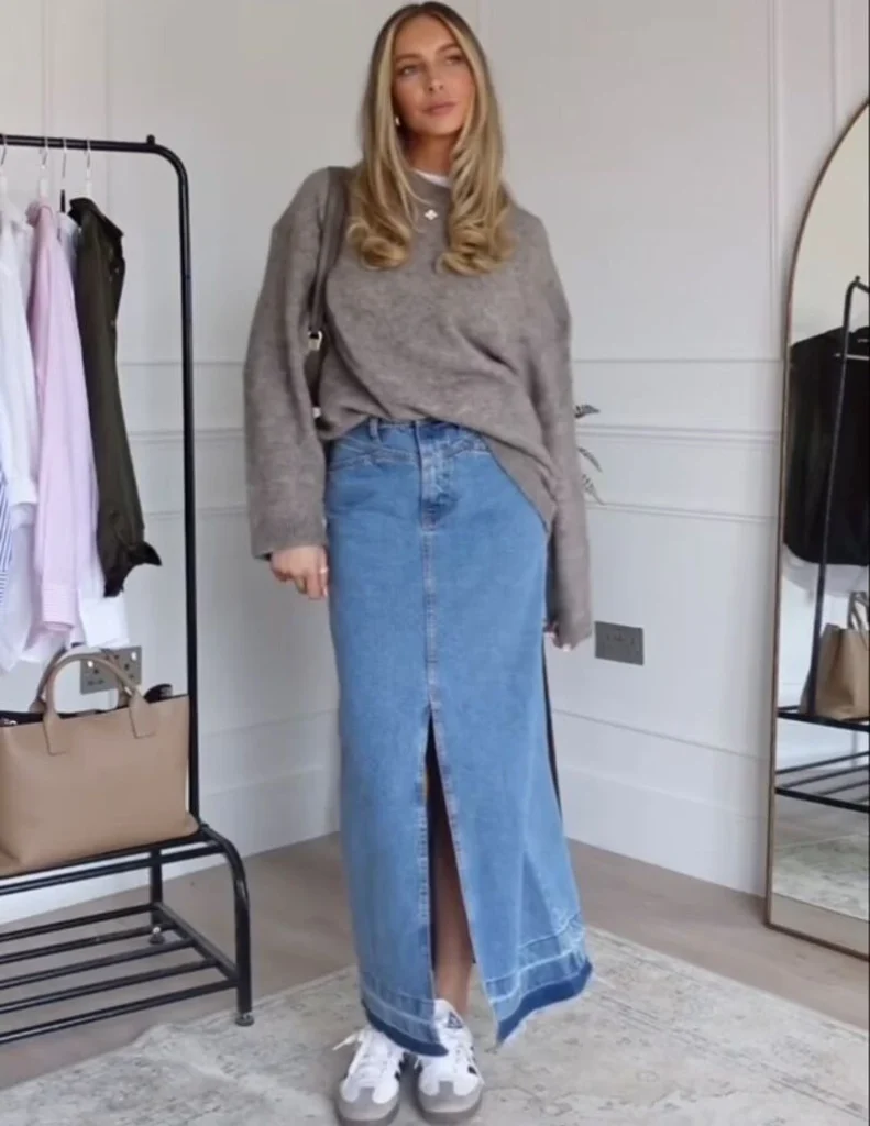 Denim maxi skirt, cropped sweatshirt, and platform sneakers