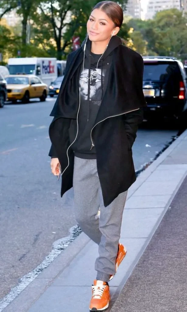 Draped Black Coat With Gray Sweats