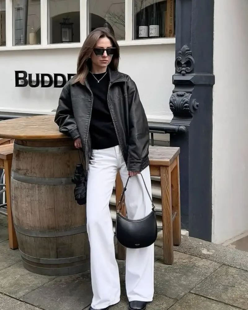 Faux Leather Jacket, Black Knit, and White Wide-Leg Denim