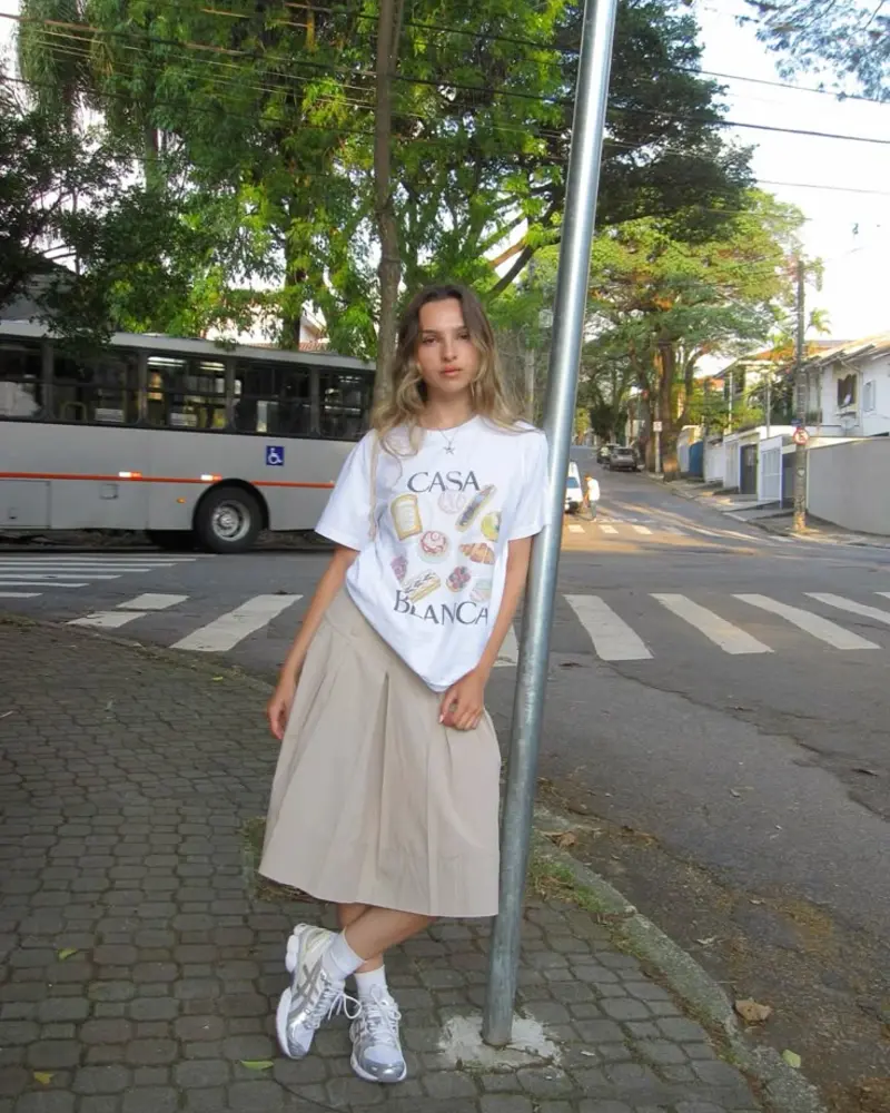 Graphic Tee + Pleated Midi Skirt + Retro Sneakers