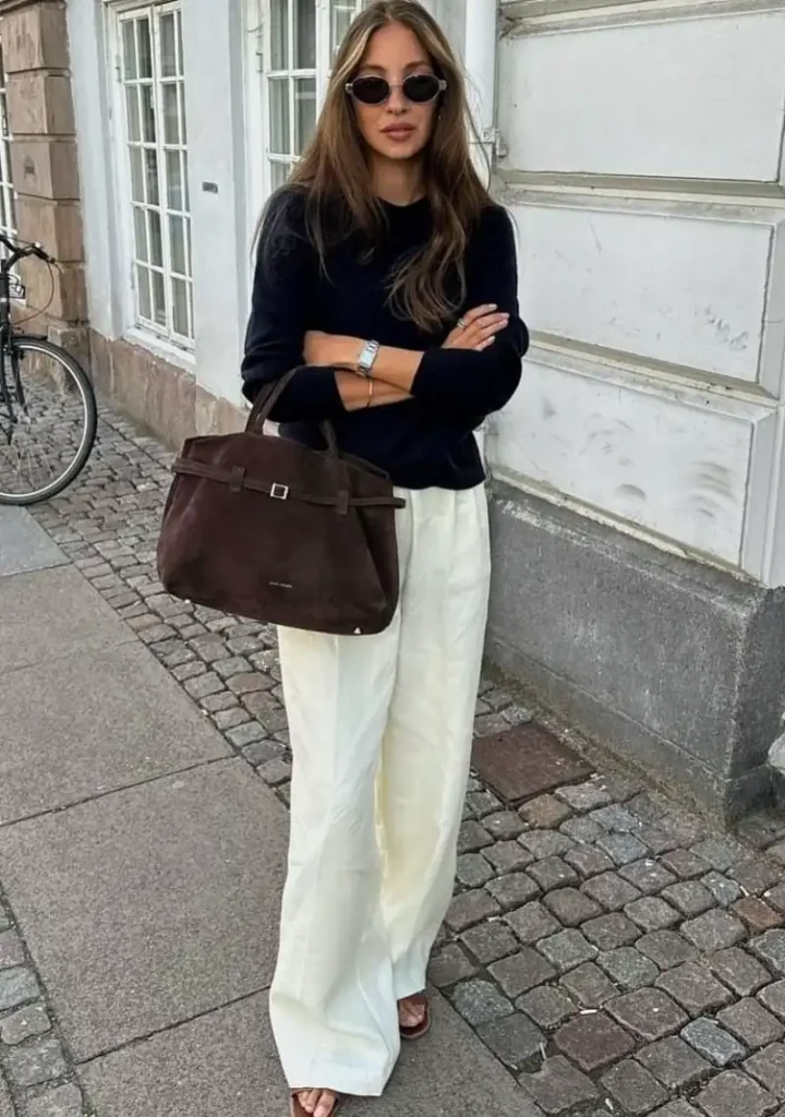 Navy Sweater and Cream Pleated Trousers