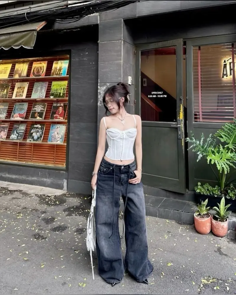 White Corset Top with Black Wide-Leg Denim