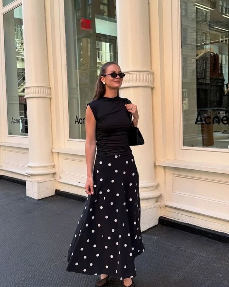 Black Top and Polka-Dot Midi Skirt
