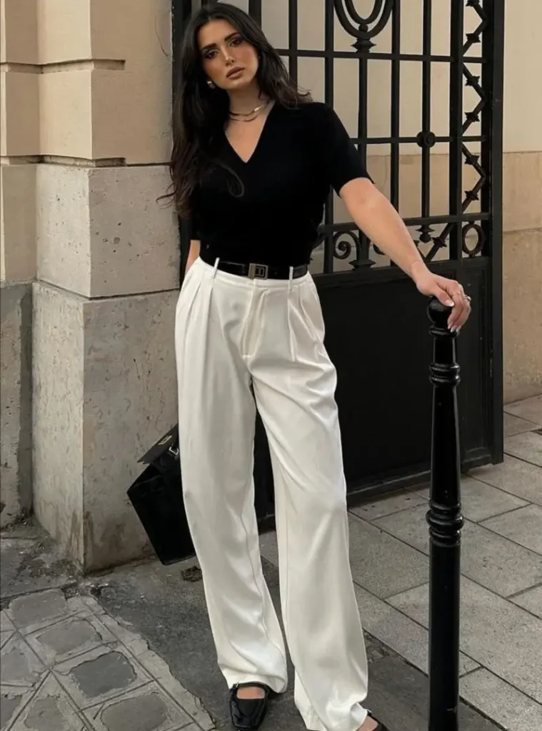 Black V-Neck Top With Cream Trousers