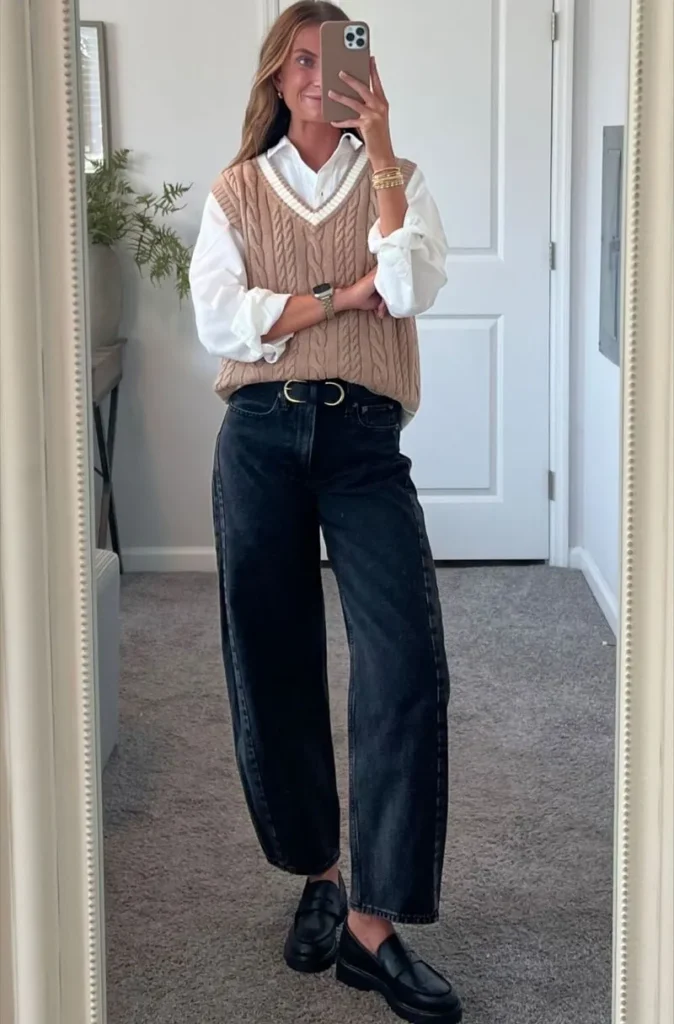Cable-Knit Vest With a White Shirt and Dark Jeans