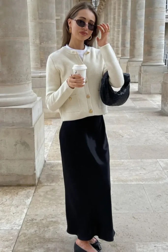 Cream Cardigan With a Black Satin Skirt