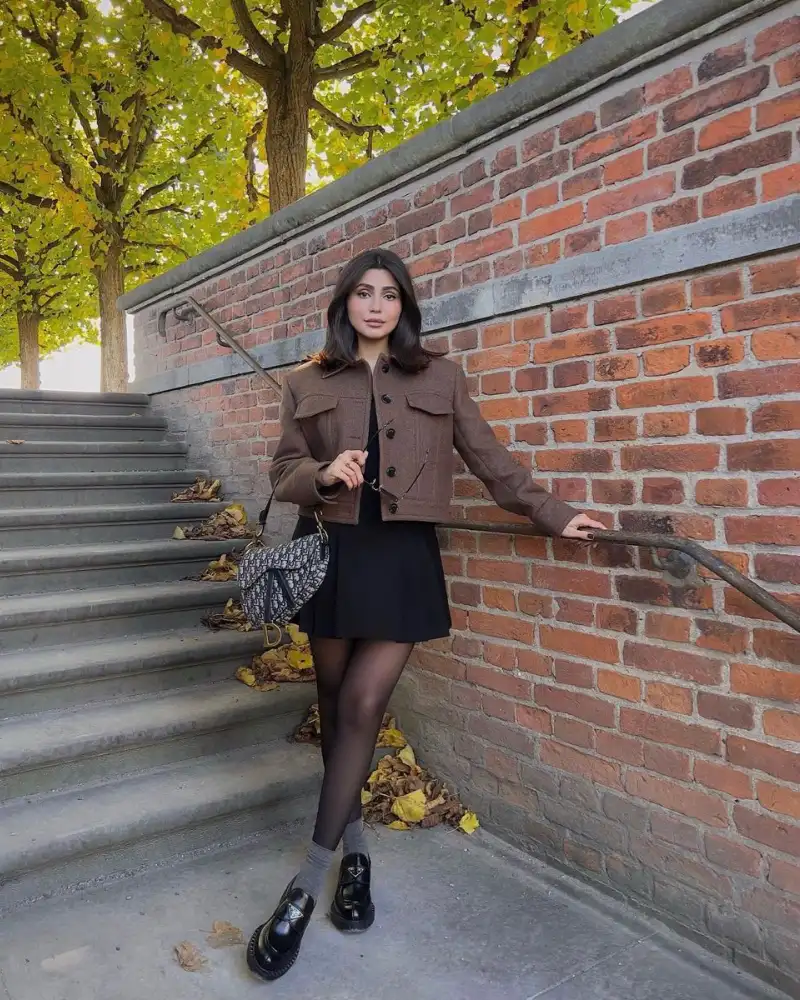  Cropped Brown Jacket With a Black Mini Skirt