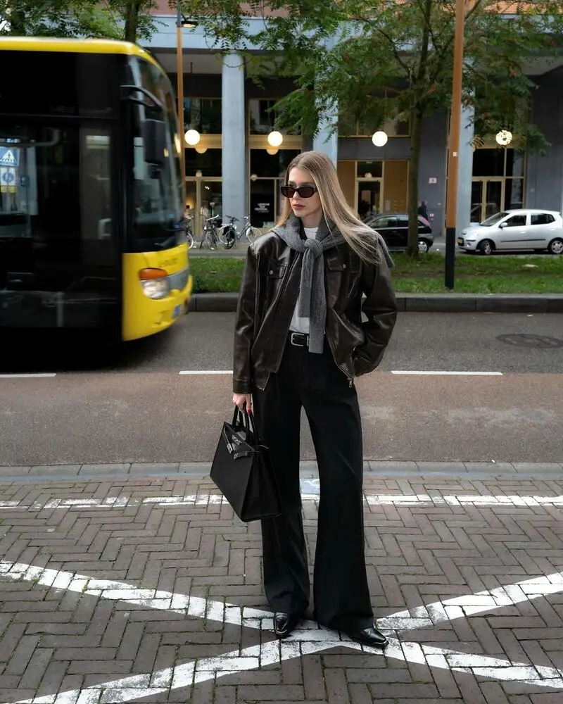 Leather Jacket With a Gray Knit Scarf