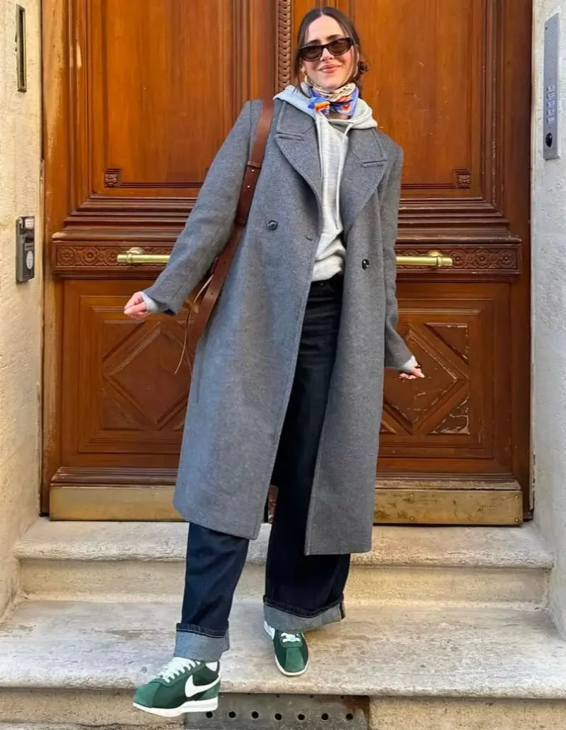 Long Charcoal Coat Over a Gray Hoodie