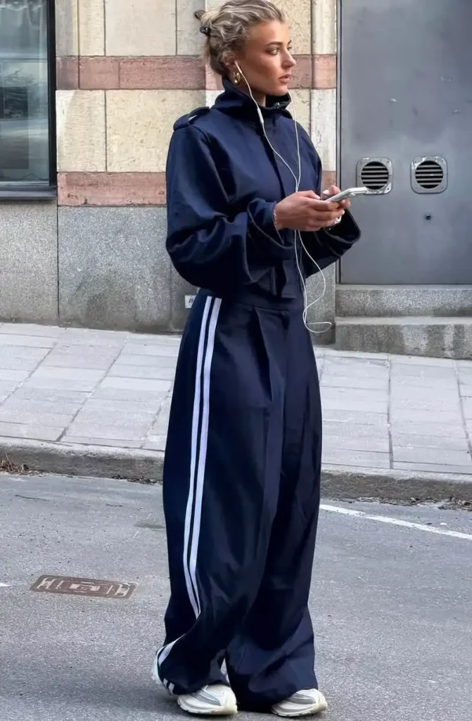  Navy Tracksuit With White Stripes and Retro Sneakers