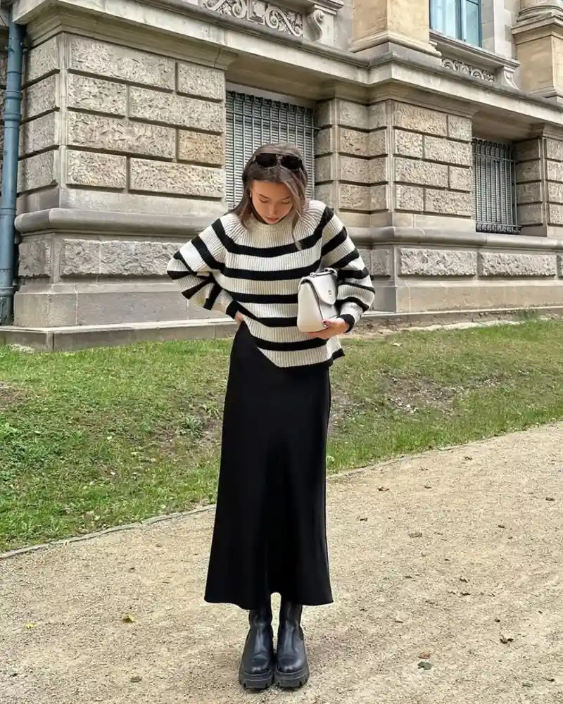 Striped Sweater and Black Midi Skirt